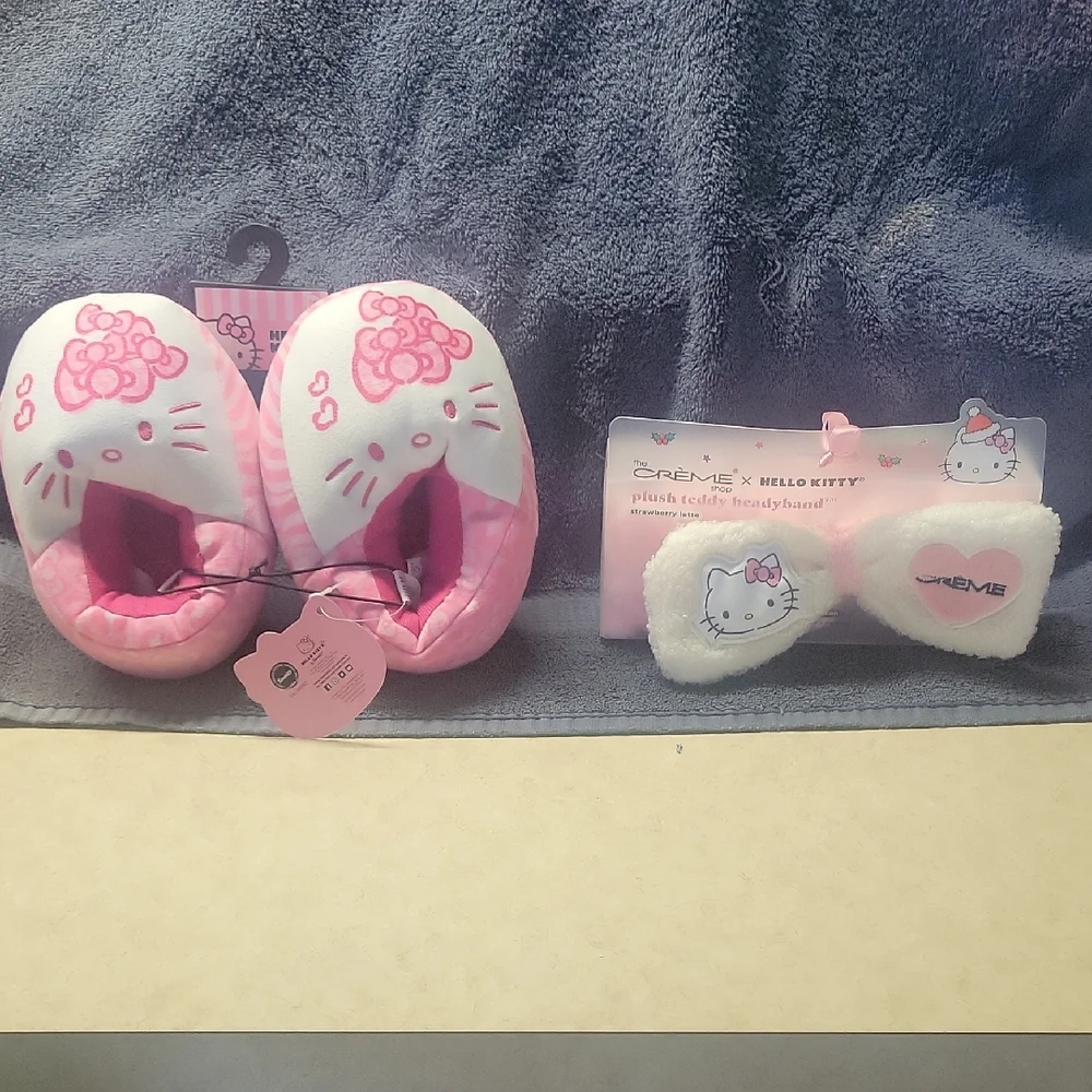 Hello Kitty Pink Plush Slippers and Headband Set. Skippers are size 7/8.